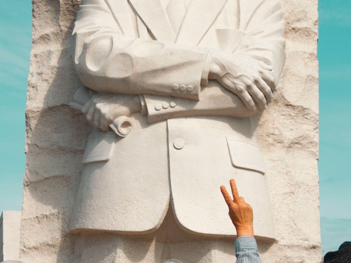 martin-luther-king-junior-stone-carving-woman-peace-sign